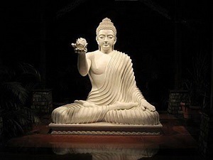 Buddha offering a lotus